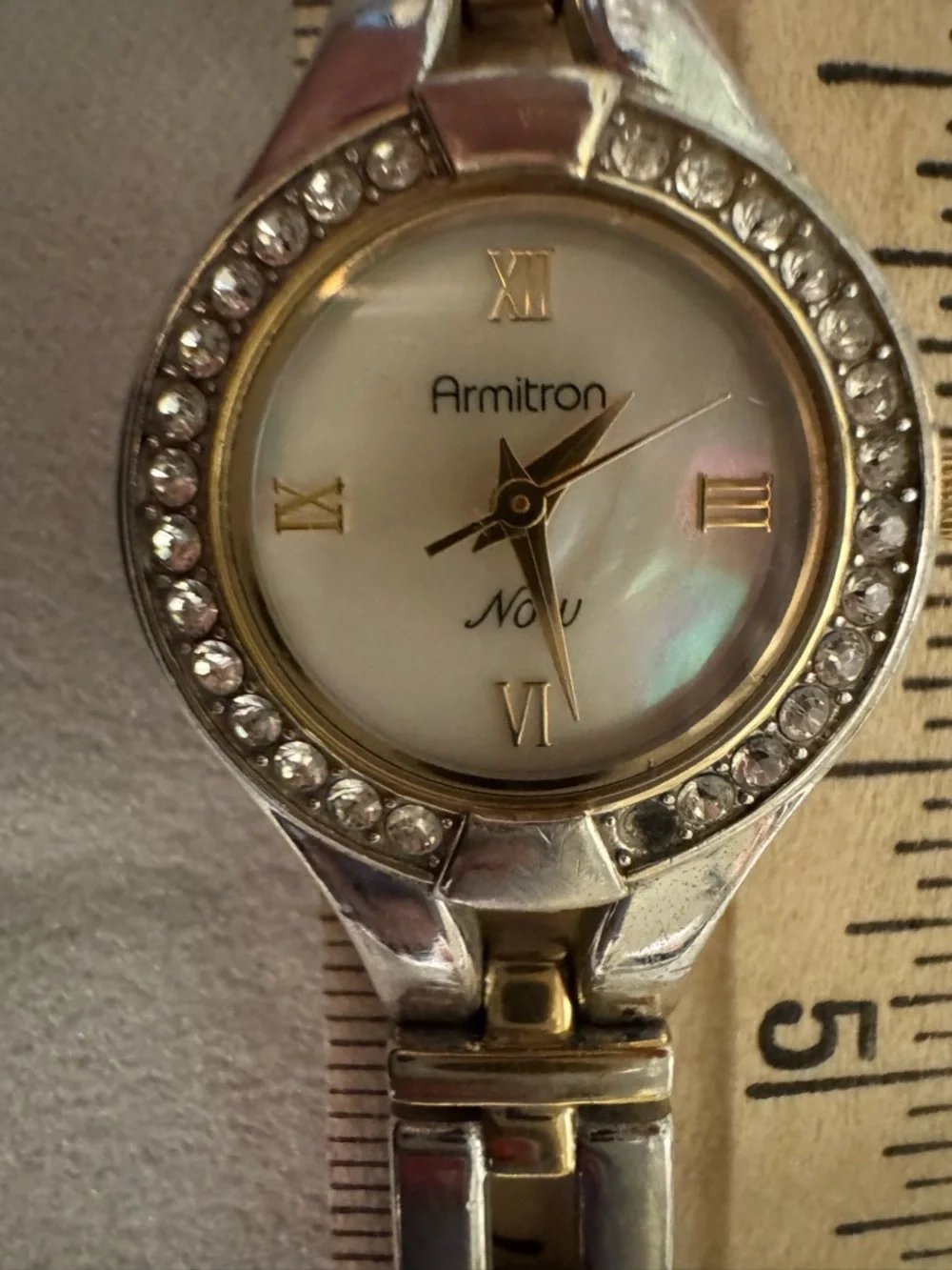 Armitron Two-Tone Silver and Gold Crystal Bezel Women's Watch